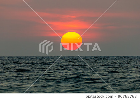 The sun is falling into the sea. , The sky is orange And the sea is dark The sun is falling into the sea. , The sky is orange And the sea is dark 90765768