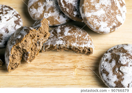large number of gingerbread on the table 90766879