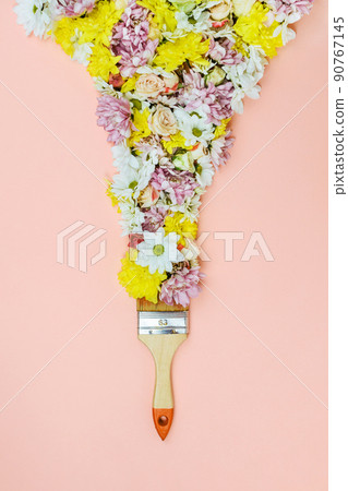 Bristle paint brush with various flowers on pink Bristle paint brush with various flowers on pink 90767145