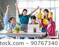 Asian business man, woman work together, celebrate success in start up office 90767340