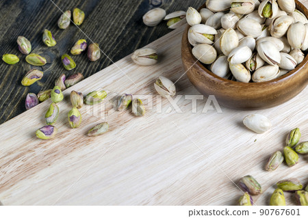 fried green pistachio nuts in a shell fried green pistachio nuts in a shell 90767601