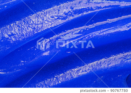 Blue gel texture. Cosmetic clear liquid cream smudge. Skin care product sample closeup. Toothpaste or wax 90767780