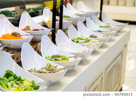 Salad bar with vegetables in restaurant. Healthy food concept 90769015
