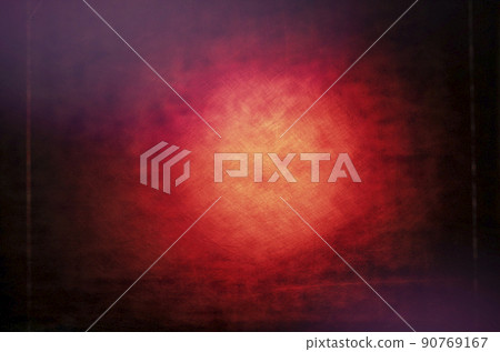 Red grunge background with a dark vignette and a light spot in the middle. 90769167
