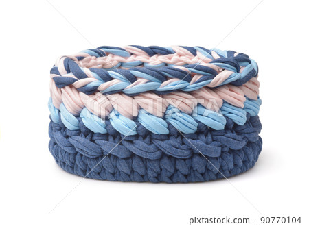 Front view of knitted round storage basket Front view of knitted round storage basket 90770104