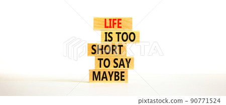 Life is short for maybe symbol. Concept words Life is too short to say maybe on wooden blocks on a beautiful white table white background. Copy space. Business motivational life or maybe concept. 90771524