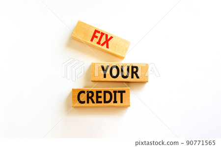 Fix your credit symbol. Concept words Fix your credit on wooden blocks on a beautiful white table white background. Business, finacial and fix your credit concept. Copy space. Fix your credit symbol. Concept words Fix your credit on wooden blocks on a beautiful white table white background. Business, finacial and fix your credit concept. Copy space. 90771565