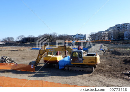 Yumbo waiting at the river construction site Yumbo waiting at the river construction site 90773518