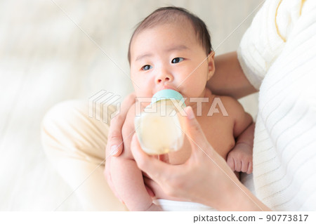 Baby drinking milk 1 month old copy space Baby drinking milk 1 month old copy space 90773817