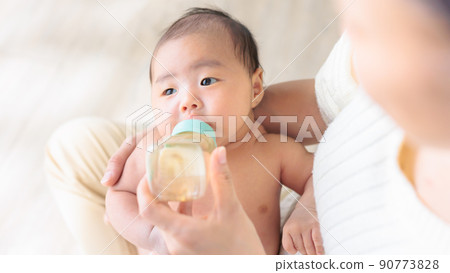 Baby drinking milk 1 month old copy space Baby drinking milk 1 month old copy space 90773828