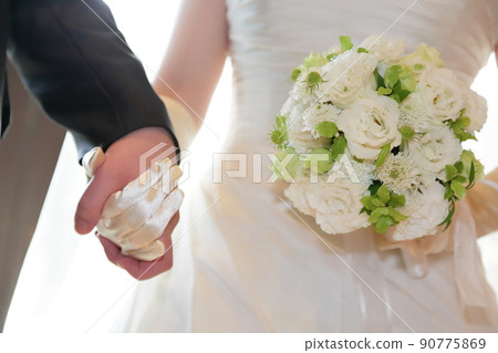 Wedding bouquet with happy bride and groom for wedding Wedding bouquet with happy bride and groom for wedding 90775869