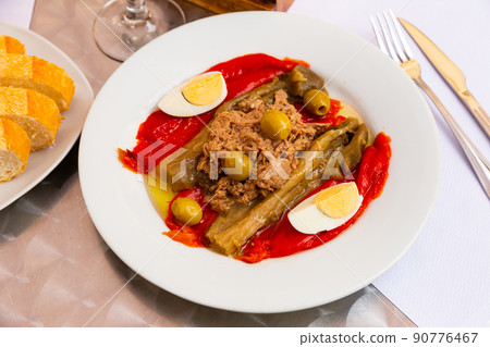 Grilled vegetable with tuna and egg on plate in restaurant Grilled vegetable with tuna and egg on plate in restaurant 90776467