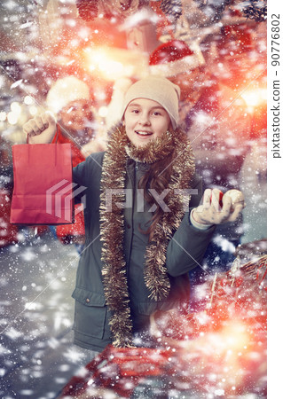 Girl at Christmas market Girl at Christmas market 90776802