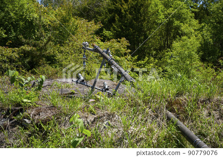 Toya Nishiyama mountain foot crater (broken telephone pole) Toya Nishiyama mountain foot crater (broken telephone pole) 90779076