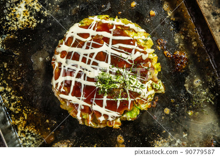 Okonomiyaki at the camp Japanese Traditional Pizza Okonomiyaki 90779587