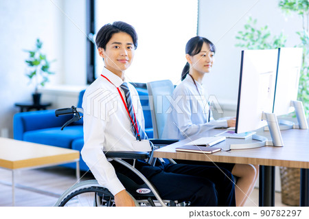 Young man in a wheelchair with a disability Young man in a wheelchair with a disability 90782297