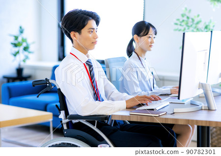 Young man in a wheelchair with a disability 90782301