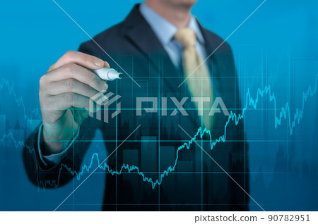 Financial growth concept. Businessman pointing graph corporate future growth plan on dark blue. Economic Recovery Process after the Coronavirus Pandemic. Financial growth concept. Businessman pointing graph corporate future growth plan on dark blue. Economic Recovery Process after the Coronavirus Pandemic. 90782951