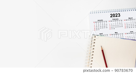 Calendar Year 2023 schedule with blank note for to do list on paper background. Flat lay with calendar, pencil on calander 2023. Close-up of a pencil on the page of a calendar 2022. isolated on white Calendar Year 2023 schedule with blank note for to do list on paper background. Flat lay with calendar, pencil on calander 2023. Close-up of a pencil on the page of a calendar 2022. isolated on white 90783670