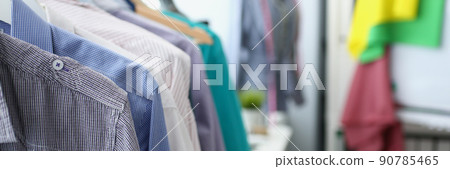 Rail with hanging of set with different colours mens shirts 90785465
