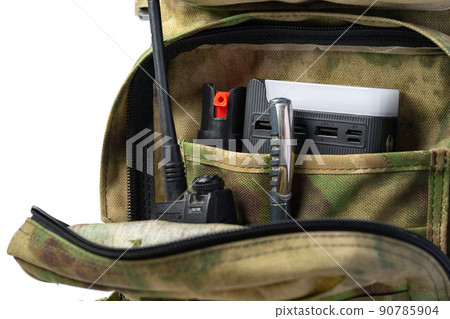 Open military backpack of khaki color on a white background Open military backpack of khaki color on a white background 90785904