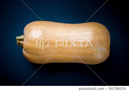 Butternut squash isolated on black background Butternut squash isolated on black background 90786016