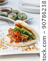 Taiwanese Food Gua Bao, Asian hamburger or sandwich from steamed rice bun with red-cooked pork belly. 90786238