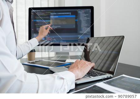 Programmer, Man working with computer programming, professional development, and coding technology, working on high-quality visual software development websites 90789057