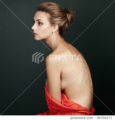 Fashion portrait of beautiful woman in elegant red dress Fashion portrait of beautiful woman in elegant red dress 90790271