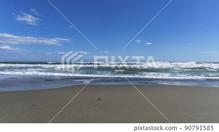 sand beach with waves in summer