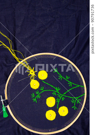 woolen handicraft work with circle frame on cloth woolen handicraft work with circle frame on cloth 90791736
