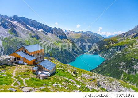 Alpine valley and mountain hut Alpine valley and mountain hut 90791988