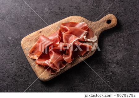 Spanish serrano ham with olives and breadstick Spanish serrano ham with olives and breadstick 90792792