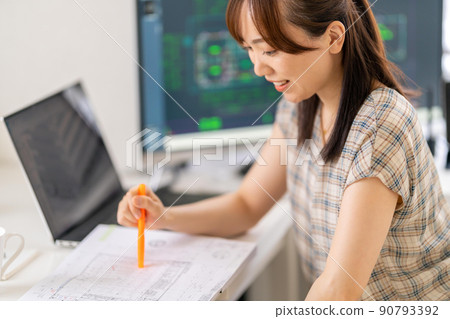 Young female first-class architect working from home Plan Young female first-class architect working from home Plan 90793392
