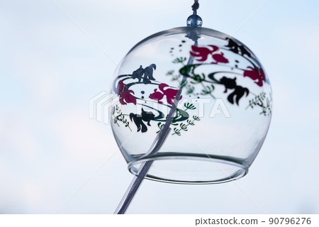 Glass wind chime swaying in the wind h Glass wind chime swaying in the wind h 90796276
