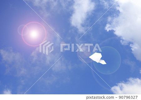 Paper plane flying in the sky 90796327