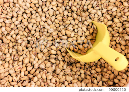 food background. closeup of pistachio nuts. 90800330