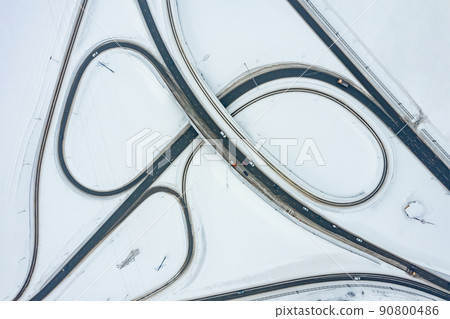 Aerial top view of overpass or road junction in winter Aerial top view of overpass or road junction in winter 90800486