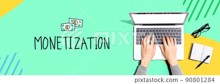 Monetization with person using a laptop Monetization with person using a laptop 90801284