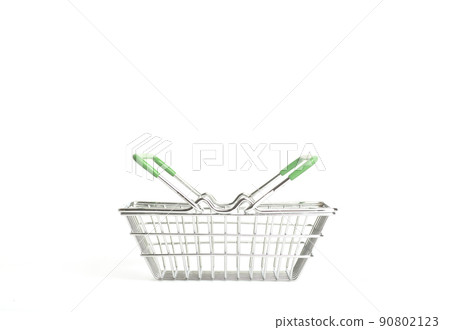 Shopping cart in a supermarket on an empty white background isolate. Shopping, groceries, goods concept. Shopping cart in a supermarket on an empty white background isolate. Shopping, groceries, goods concept. 90802123