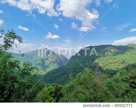 Beautiful landscape view of mountain and blue sky. tourist attraction at Ban Pha Hee in Chiangrai province. Thailand Beautiful landscape view of mountain and blue sky. tourist attraction at Ban Pha Hee in Chiangrai province. Thailand 90802771