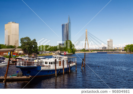 Panorama of Riga with  Vant bridge,  small entertainment  boat on left-side  bank  of Riga 90804981