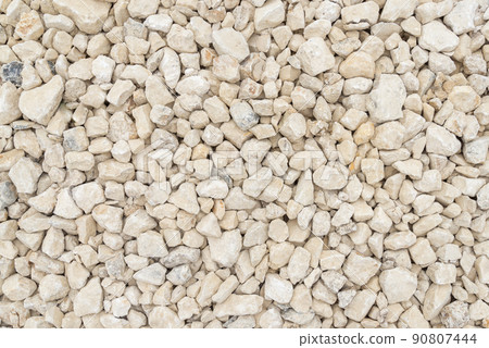 Gray gravel for laying of asphalt roads and filling of emptiness. Background 90807444
