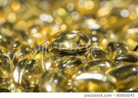 Background of scattered fish oil omega pills 90808045