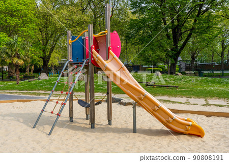 Playground slide in the park Playground slide in the park 90808191