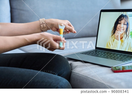 Video call chat conference, young woman consultation on use, cosmetic mask Video call chat conference, young woman consultation on use, cosmetic mask 90808341