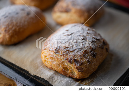 freshly baked almond croissants image 90809101