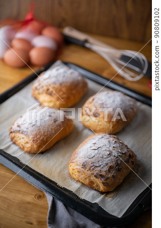 freshly baked almond croissants image 90809102