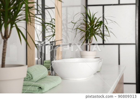 Mirror and vessel sink in stylish bathroom Mirror and vessel sink in stylish bathroom 90809313