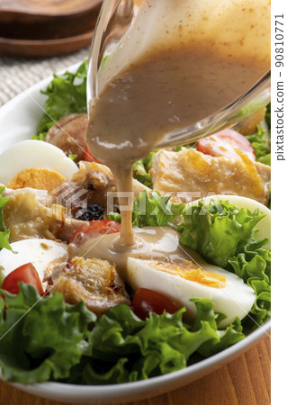Grilled chicken and vegetables with sesame dressing on chicken salad Grilled chicken and vegetables with sesame dressing on chicken salad 90810771